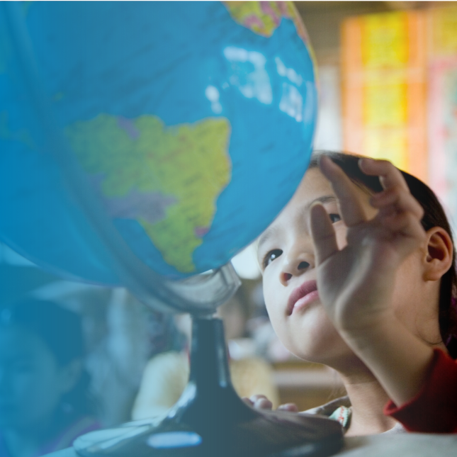 child with globe