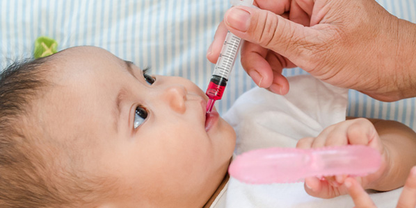 giving an infant medicine