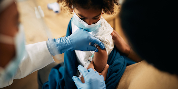 child getting vaccinated