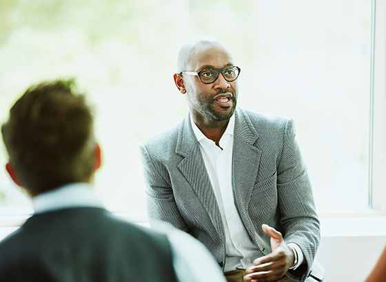 men discussing public policy